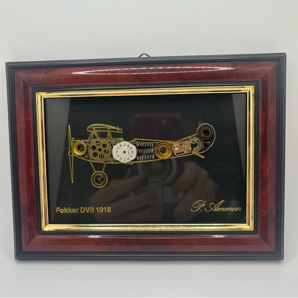 framed piece of art featuring a representation of an airplane with clock pieces - Picture 1 of 10